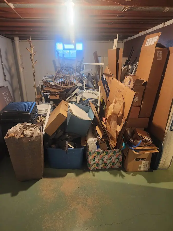 Roll-off dumpster container at job site for 15 Yard Dumpster Rental in Bastrop